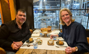 Madeleine Gielens of MaGie Creations and Mingo Wout from Bus Whisky enjoying the apple pie