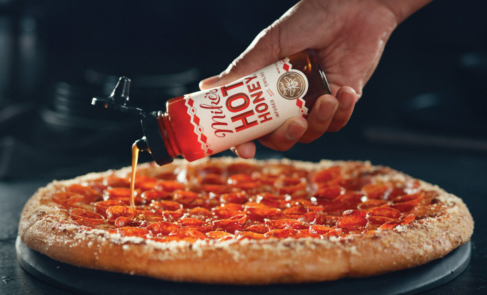 Marco's Pizza introduced the Hot Honey Magnifico Pizza for National Pizza Month